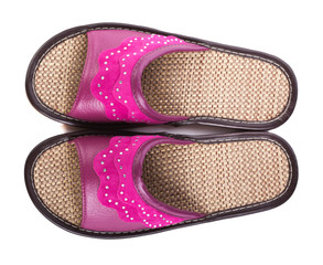 A pair of pink house slippers