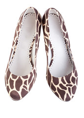 giraffe print high shoes on a white background