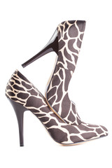 giraffe print high shoes on a white background