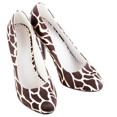 giraffe print high shoes on a white background