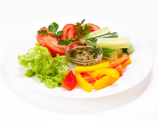 Fresh summer salad on white plate