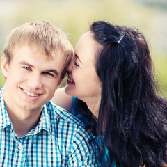 Portrait of a beautiful young happy smiling couple