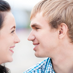 Portrait of a beautiful young happy smiling couple