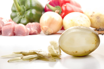 peeled potato and vegetables
