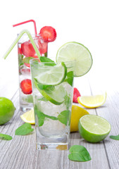 Mojito drink on wooden background