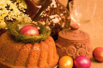 Traditional Easter cake and easter eggs with flowers