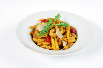 Penne alla vodka with chicken meat and salad rucola