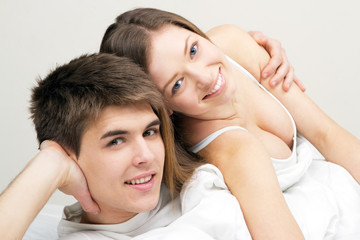 Fototapeta na wymiar Beautiful couple in bed