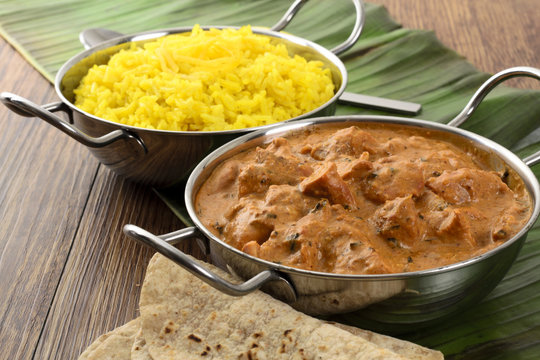 Butter Chicken & Lemon Rice -Indian curry on a banana leaf