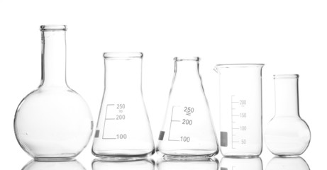 Empty laboratory glassware with reflection isolated on white