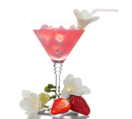 martini glass of cocktail with ice and strawberry isolated