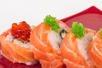 Japanese sushi traditional japanese food.Roll made of salmon, re