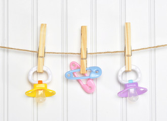 Baby Pacifier Binky Pink on a Clothesline