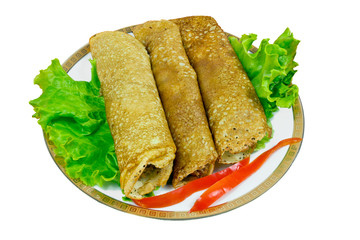 Stuffed fried pancakes with meat .