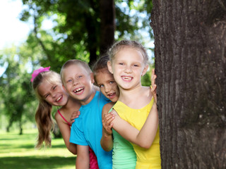 Children playing in the summer park