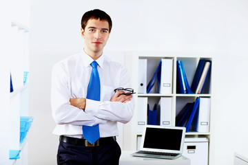 Young businessman in office