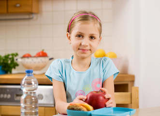 girl with lunch box © mbt_studio