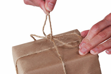 Obraz premium Untying string on a package