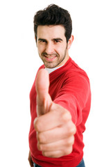 A smiling man showing thumb up sign, isolated on white backgroun