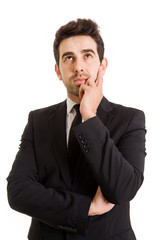 thinking young business man in white background