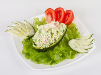 Crab meat salad with green caviar in avocado - japan cusine