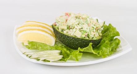Crab meat salad with green caviar in avocado - japan cusine