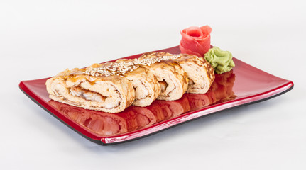 Omelet Maki Sushi - Roll made of Smoked Eel inside. Topped with