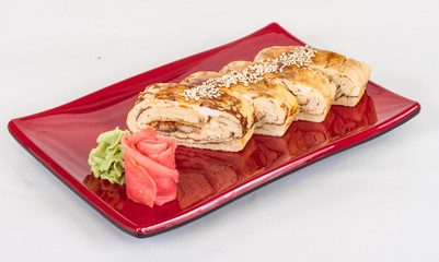 Omelet Maki Sushi - Roll made of Smoked Eel inside. Topped with