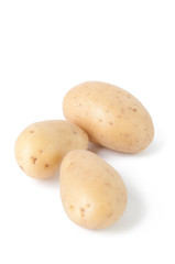 Three potatoes isolated on white