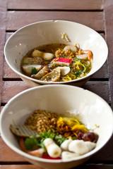 Wonton noodles, dried yellow frame.