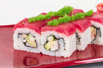 Maki Sushi - Roll made of Crab, avocado, cucumber inside. Fresh