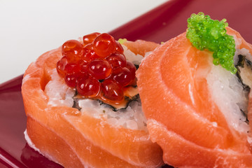 Japanese sushi traditional japanese food.Roll made of salmon, re