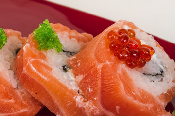 Japanese sushi traditional japanese food.Roll made of salmon, re