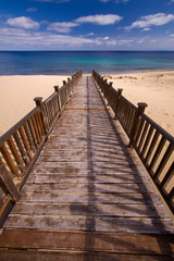 Wooden footbridge on the beach
