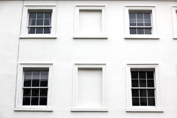 Georgian windows architecture on a wall house, London, UK