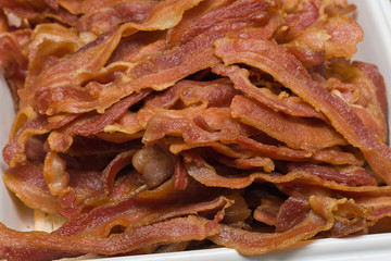 Slices of fried bacon