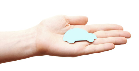 woman hands holding blue car isolated on white background