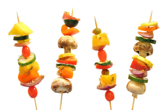 Fototapeta Vegetable kebabs with peppers, mushrooms, tomatoes, pineapple