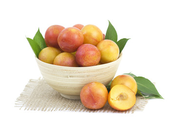 fresh plums in a bowl