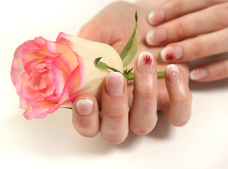 Obraz na płótnie Canvas hands with rose