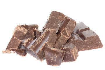 dark chocolate pieces isolated on white