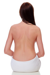 Naklejka premium Naked female torso against white background