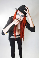 Expressive gothic woman with artistic makeup