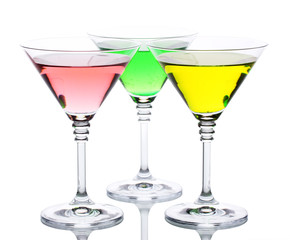 alcoholic cocktails on table isolated on white