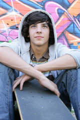 teenage boy with a skate board
