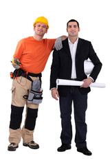 businessman and craftsman posing together