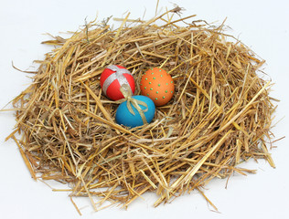 Easter eggs in a nest of straw