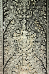 Carvings on wall and terrace of Angkor Wat
