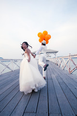 couples of man and women in wedding suit