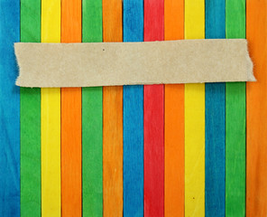 blank paper on color wood background